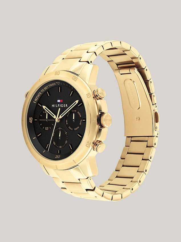 gold sportowy zegarek z czarną tarczą dla mężczyźni - tommy hilfiger