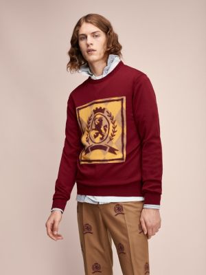 red tommy jumper