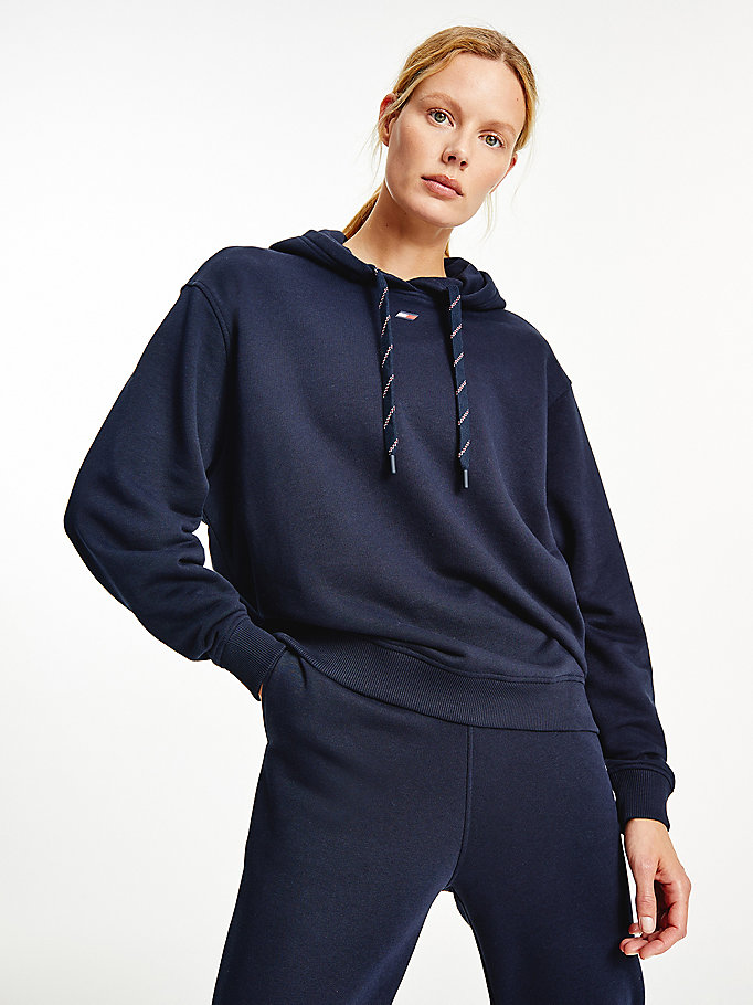 blauw sport relaxed fit hoodie met signature-tape voor dames - tommy hilfiger