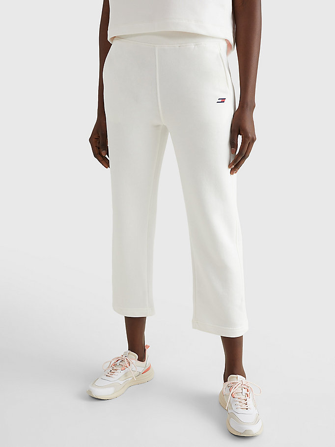 white sport 7/8 length flared joggers for women tommy hilfiger