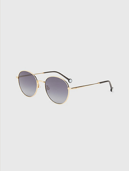 occhiali da sole con montatura tonda oro da women tommy hilfiger