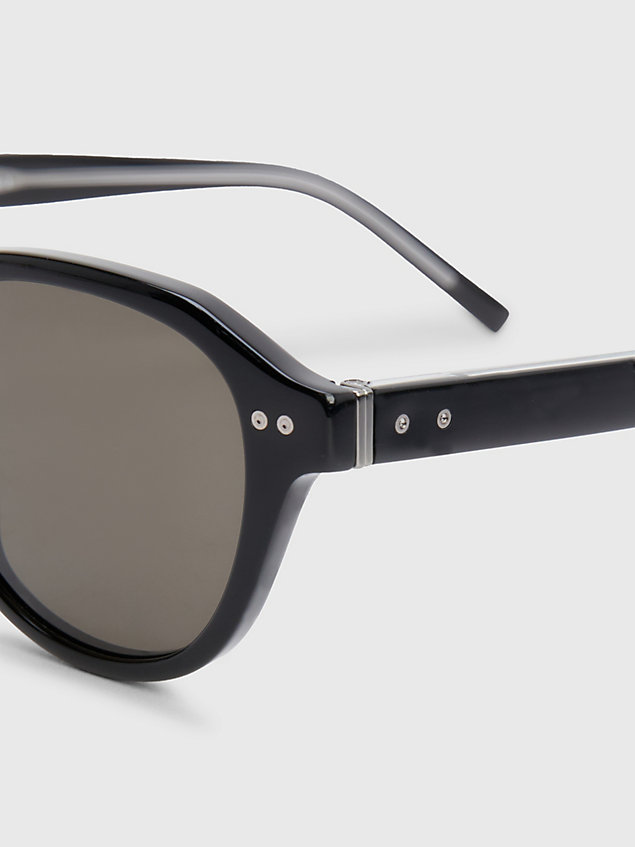 black runde sonnenbrille mit nieten-detail für unisex - tommy hilfiger