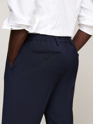 pantaloni slim fit con pieghe blu da uomini tommy hilfiger