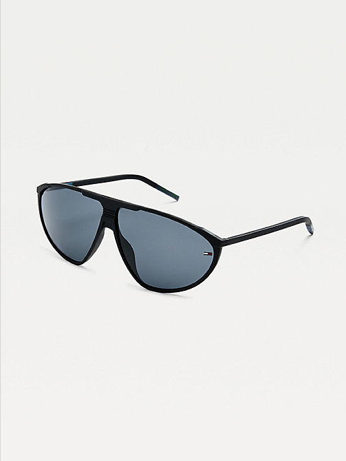 black triangular sunglasses for unisex tommy jeans