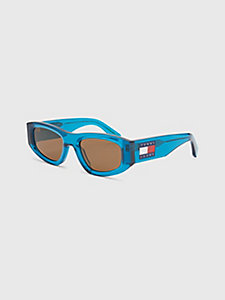 blauw transparante zonnebril met ovale glazen voor unisex - tommy jeans