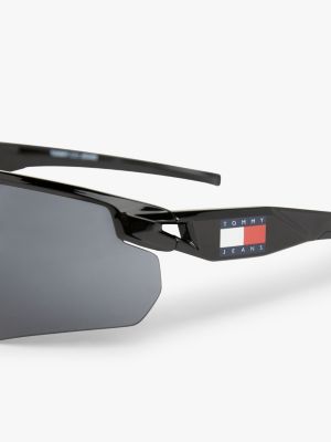 black genderneutrale verspiegelte masken-sonnenbrille für unisex - tommy jeans