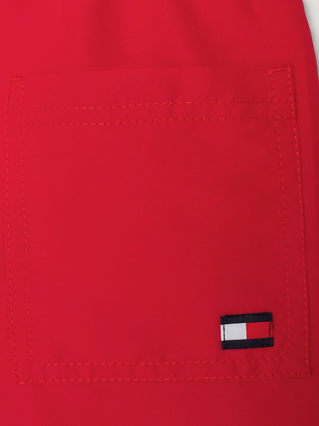 red medium lange zwemshort met streepdesign voor jongens - tommy hilfiger