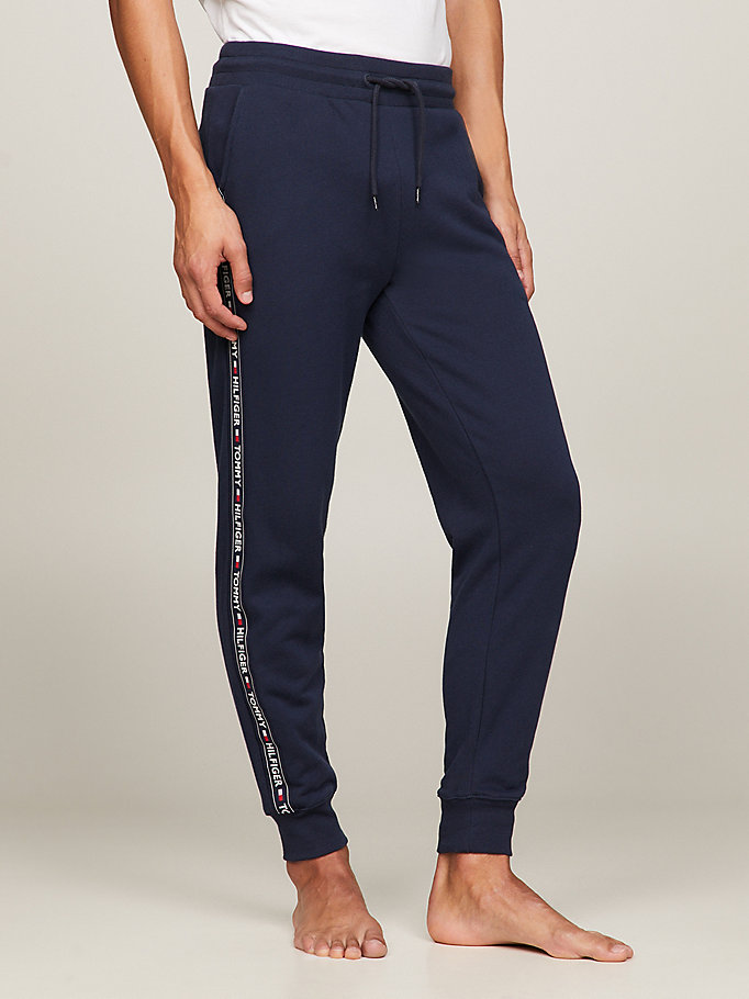 blue repeat logo tape joggers for men tommy jeans