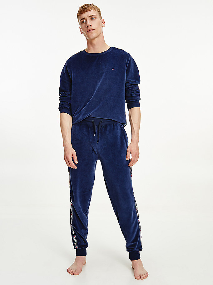 blau jogginghose mit gerippter struktur für men - tommy jeans