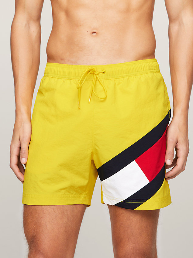 yellow flag mid length drawstring slim swim shorts for men tommy hilfiger