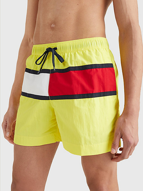 yellow hilfiger flag mid length swim shorts for men tommy hilfiger