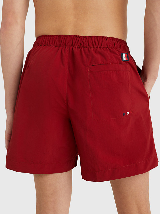 red solid mid length swim shorts for men tommy hilfiger