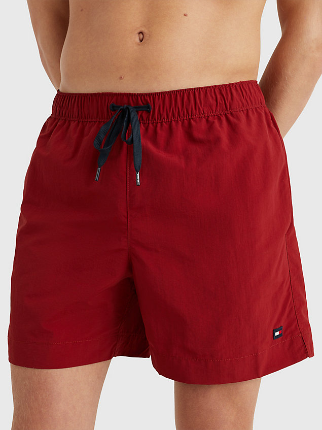 red solid mid length swim shorts for men tommy hilfiger