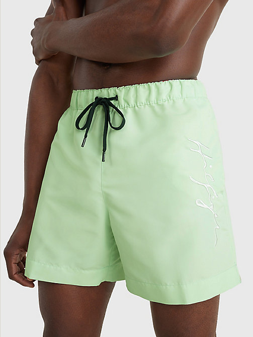 green mid length signature logo swim shorts for men tommy hilfiger