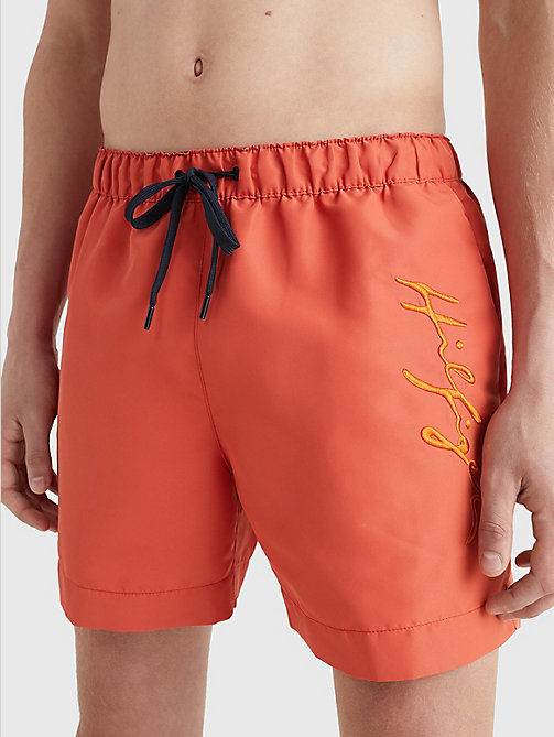 orange mid length signature logo swim shorts for men tommy hilfiger