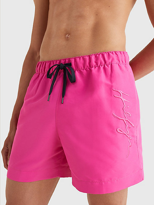 pink mid length signature logo swim shorts for men tommy hilfiger