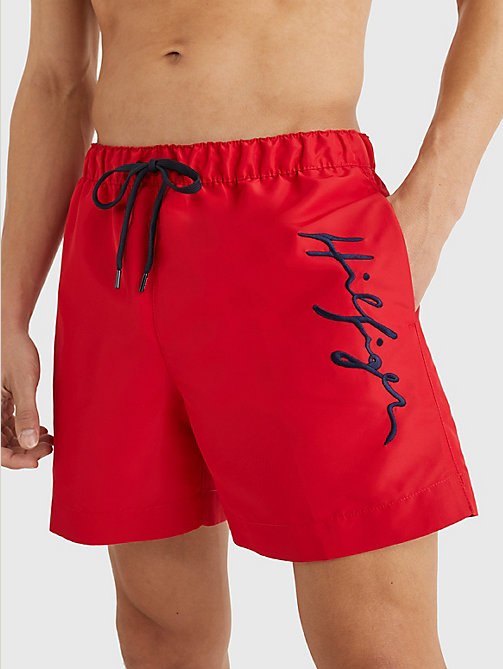 red mid length signature logo swim shorts for men tommy hilfiger