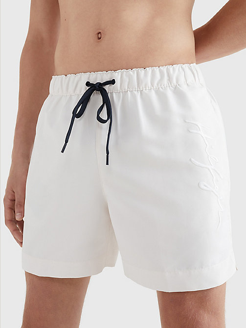 white mid length signature logo swim shorts for men tommy hilfiger