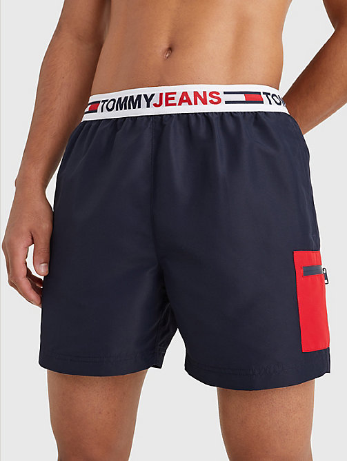 blue logo waistband mid length swim shorts for men tommy jeans