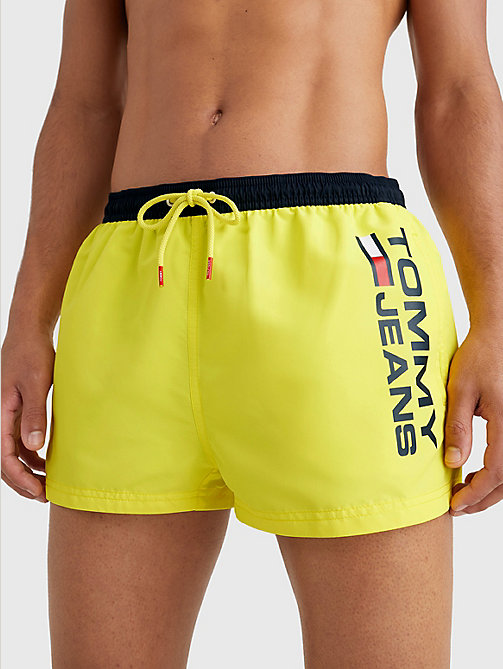 yellow contrast pocket extra short length swim shorts for men tommy jeans
