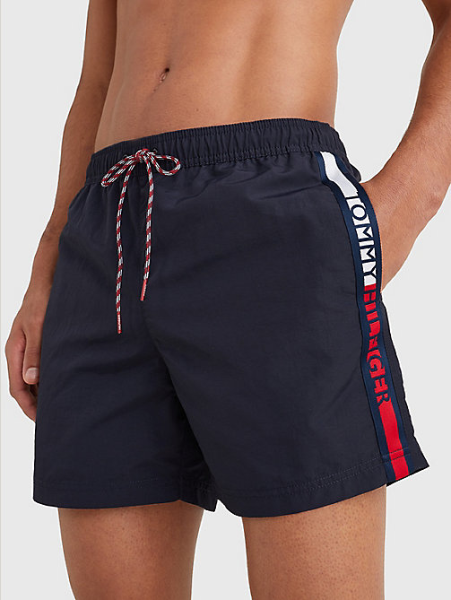 blue logo tape mid length swim shorts for men tommy hilfiger