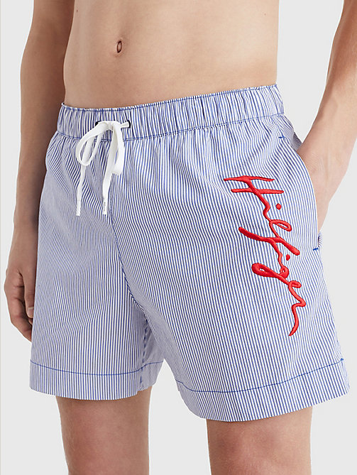 white hilfiger logo twist mid length swim shorts for men tommy hilfiger