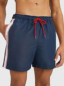 blue essential logo tape mid length swim shorts for men tommy jeans