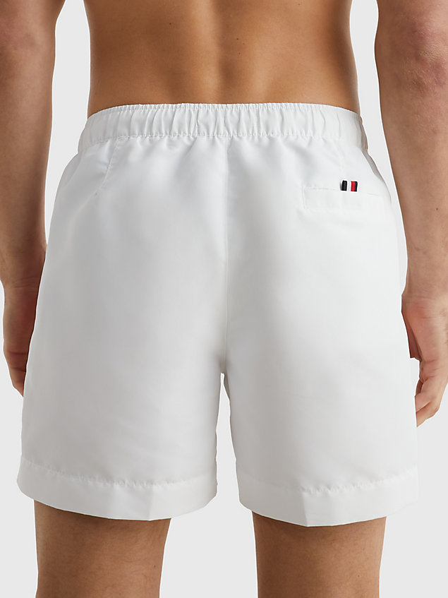 white signature tape mid length swim shorts for men tommy hilfiger