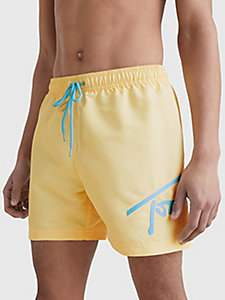 gelb badeshorts mit tunnelzug und signatur-logo für herren - tommy jeans