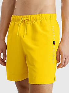 yellow logo mid length swim shorts for men tommy hilfiger