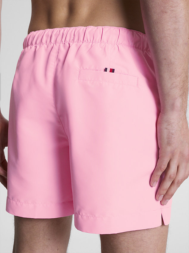 pink hilfiger logo mid length swim shorts for men tommy hilfiger