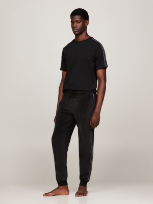 Tommy Hilfiger HERITAGE PANTS - Tracksuit bottoms - midnight/dark