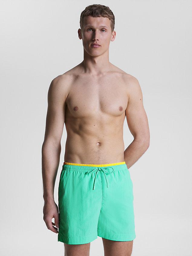 green flag recycled mid length swim shorts for men tommy hilfiger