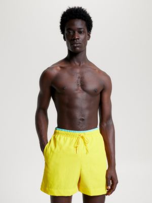 Bright yellow 2025 swim shorts