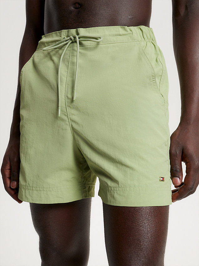 green tommy hilfiger x vacation essential mid length slim swim shorts for men tommy hilfiger