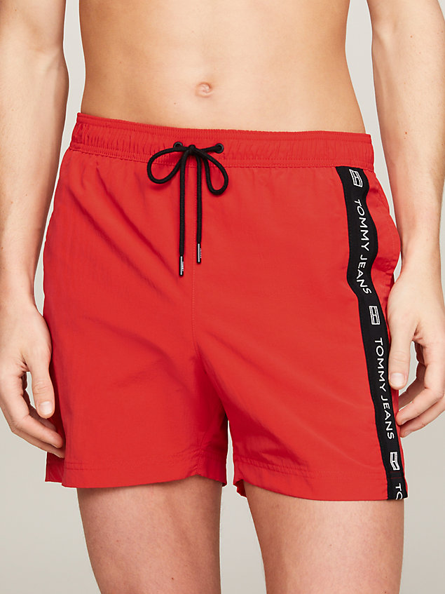red logo tape mid length slim swim trunks for men tommy jeans
