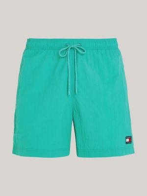 green heritage mid length crinkle swim shorts for men tommy jeans