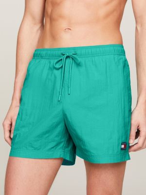 green heritage mid length crinkle swim shorts for men tommy jeans