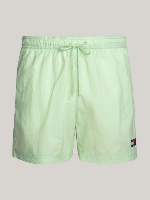 green heritage mid length crinkle swim shorts for men tommy jeans