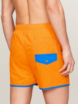 yellow contrast mid length slim swim shorts for men tommy jeans