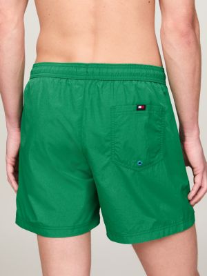 green logo mid length slim swim shorts for men tommy jeans