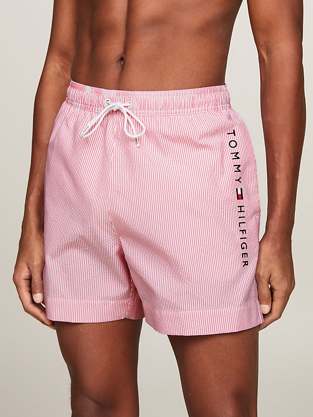 pink original ithaca stripe mid length swim shorts for men tommy hilfiger