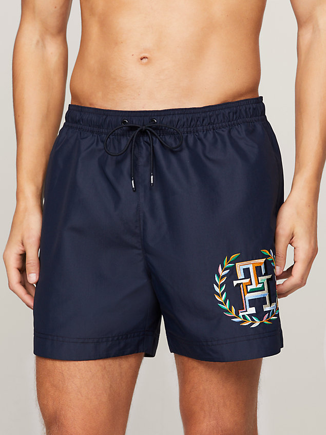 blue th monogram mid length swim shorts for men tommy hilfiger