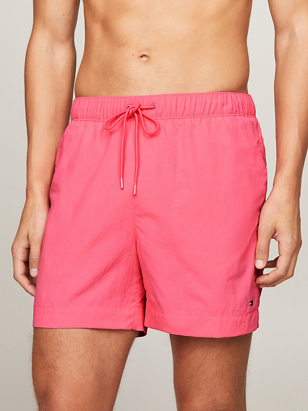 pink th essential drawstring mid length swim shorts for men tommy hilfiger