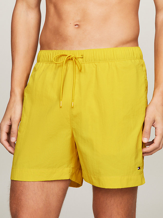 yellow th essential drawstring mid length swim shorts for men tommy hilfiger