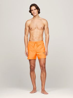 orange hilfiger logo mid length swim shorts for men tommy hilfiger