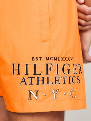 orange hilfiger logo mid length swim shorts for men tommy hilfiger