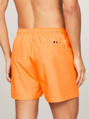 orange hilfiger logo mid length swim shorts for men tommy hilfiger