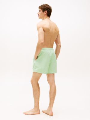 short de bain mi-long signature à logo vert pour hommes tommy hilfiger