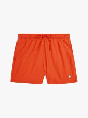 orange th monogram mid length swim trunks for men tommy hilfiger